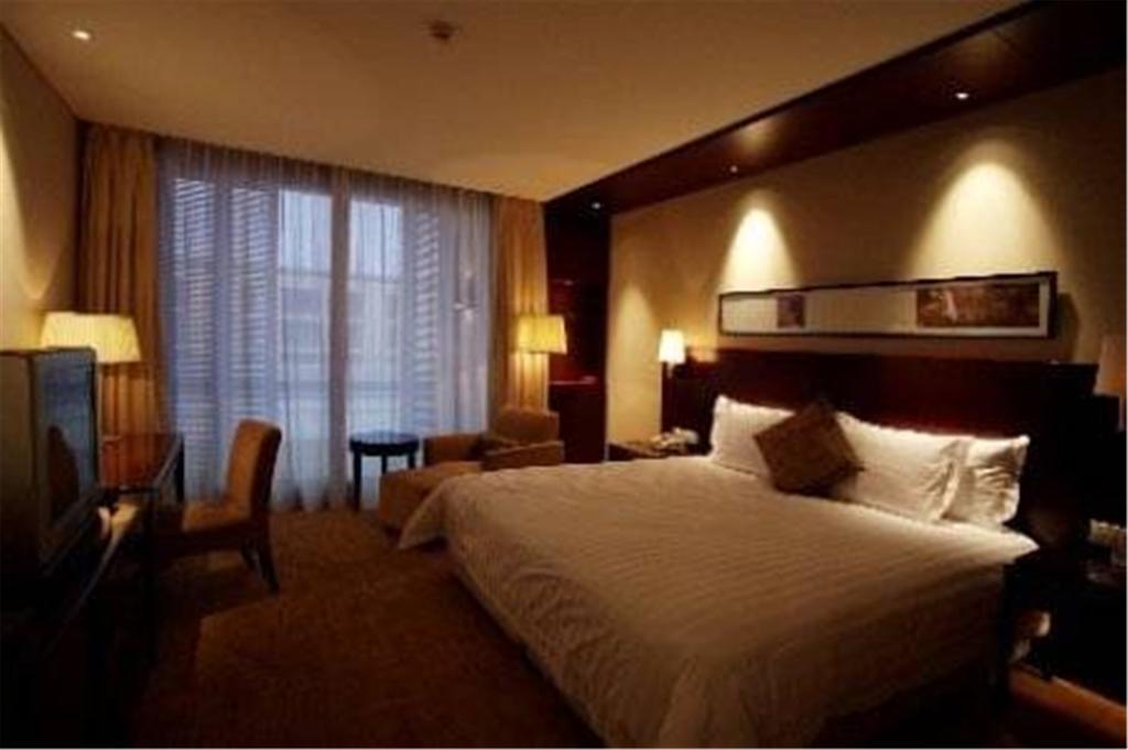 Howard Johnson Plaza Lingang Shanghai Nanhui Zimmer foto