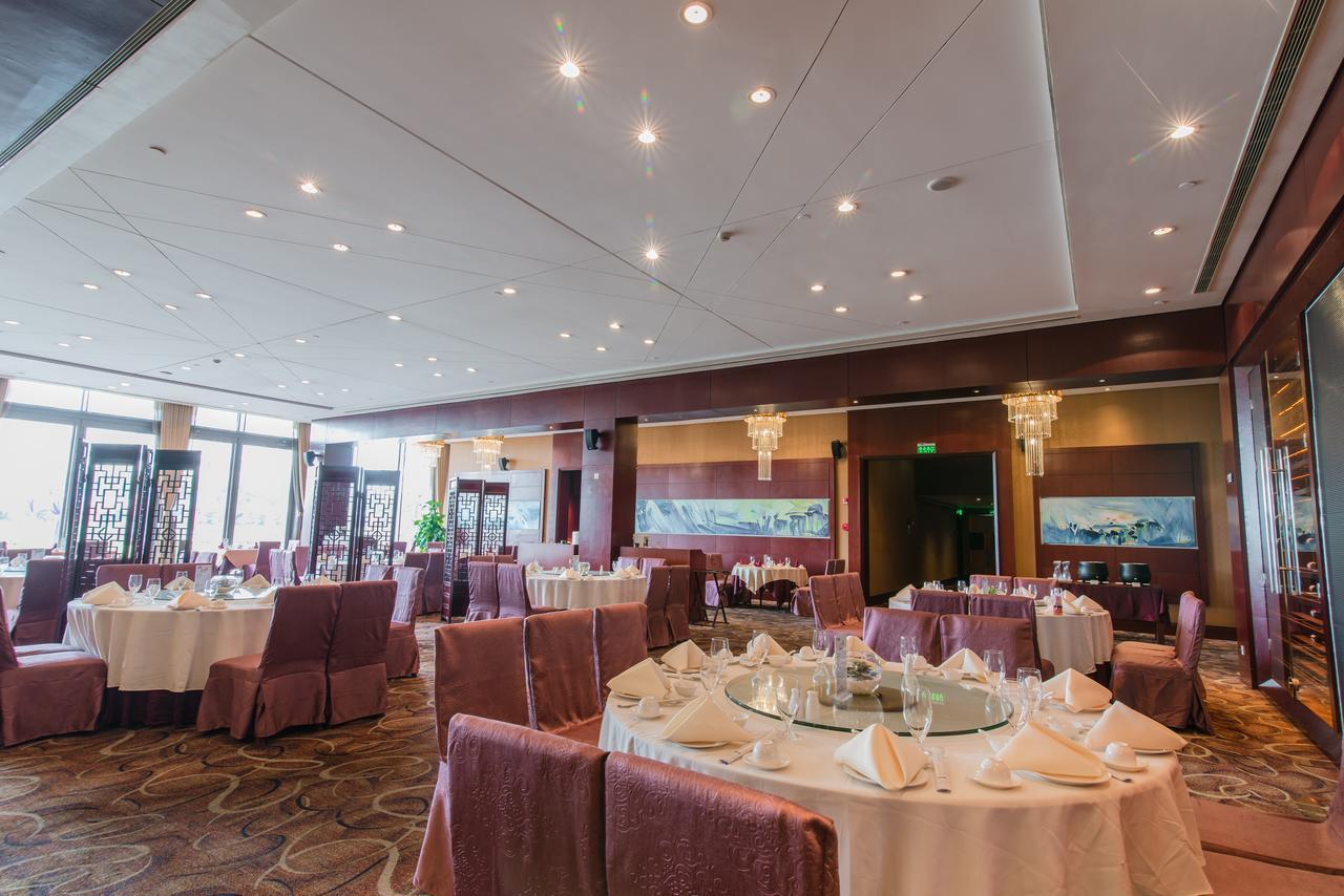 Howard Johnson Plaza Lingang Shanghai Nanhui Exterior foto