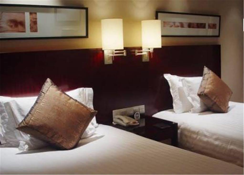 Howard Johnson Plaza Lingang Shanghai Nanhui Exterior foto